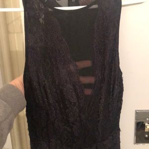 New Bebe dress with sheer back. New with tags